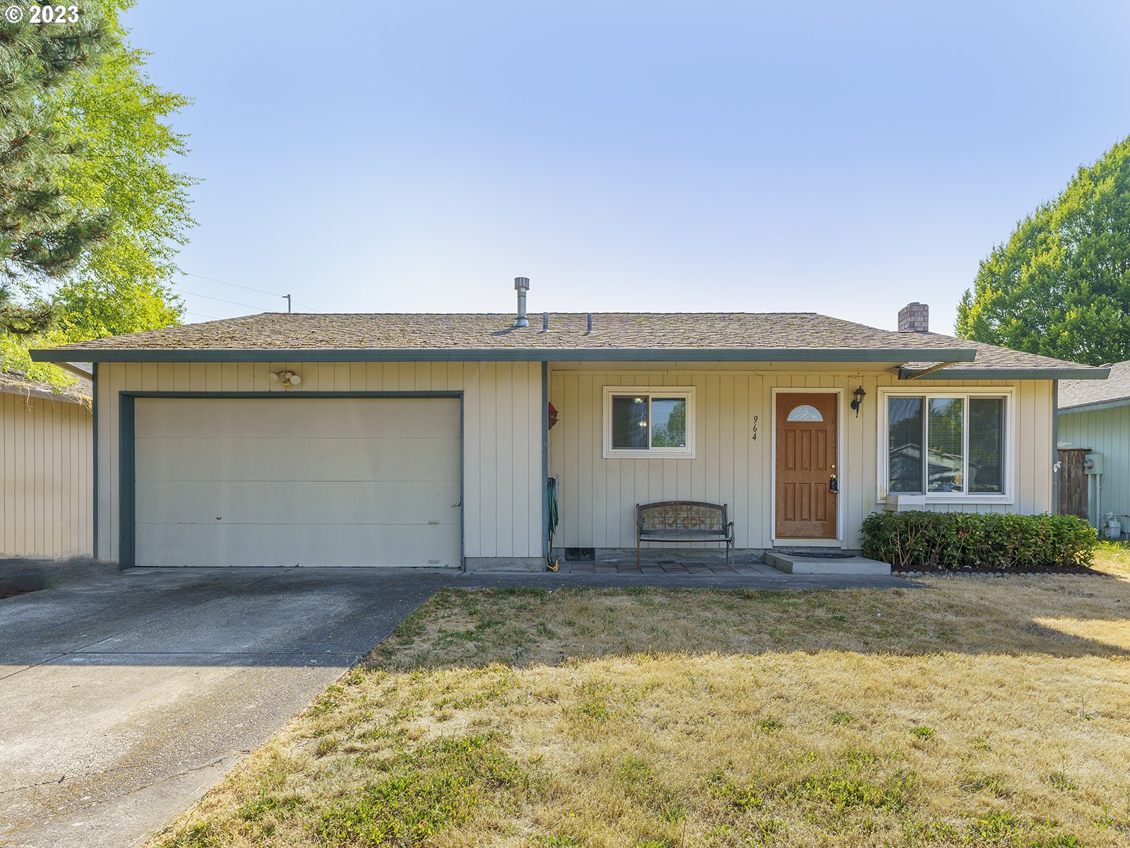 964 Southwest 179th Avenue Beaverton, OR 97003 - Photo 1 of 27 a front view of house with yard