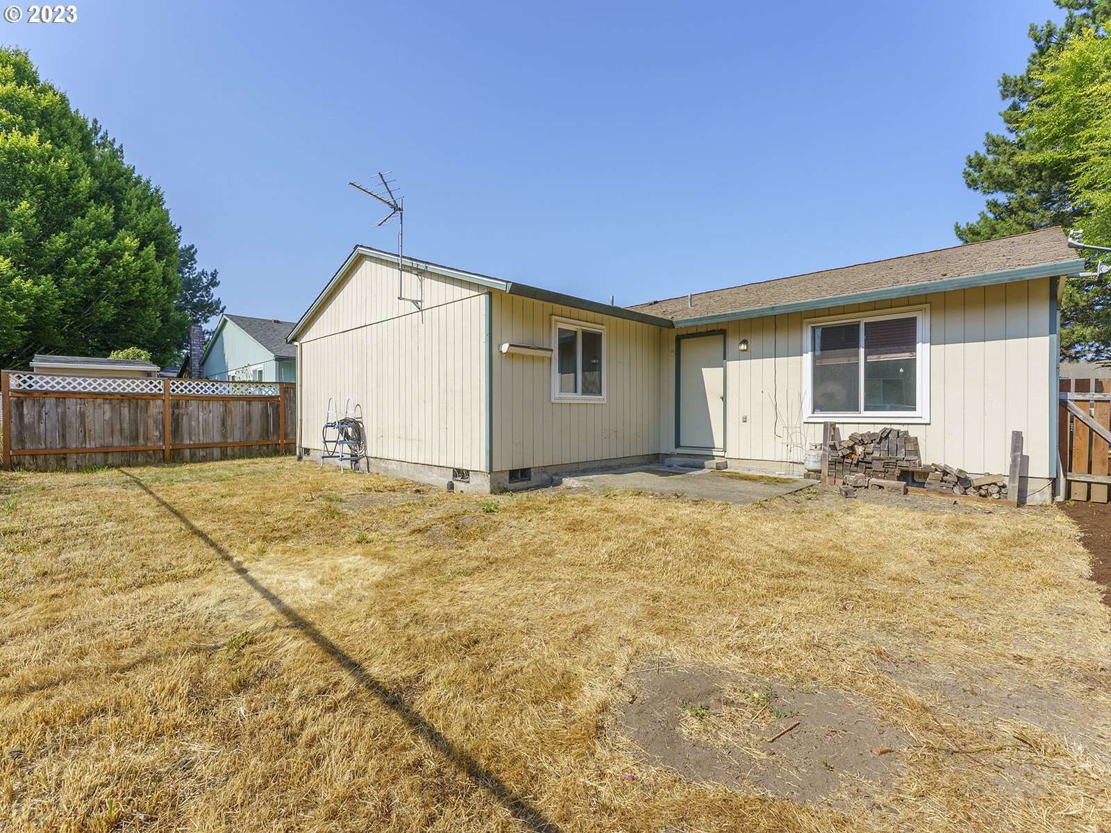 964 Southwest 179th Avenue Beaverton, OR 97003 - Photo 23 of 27 a view of a house with a yard