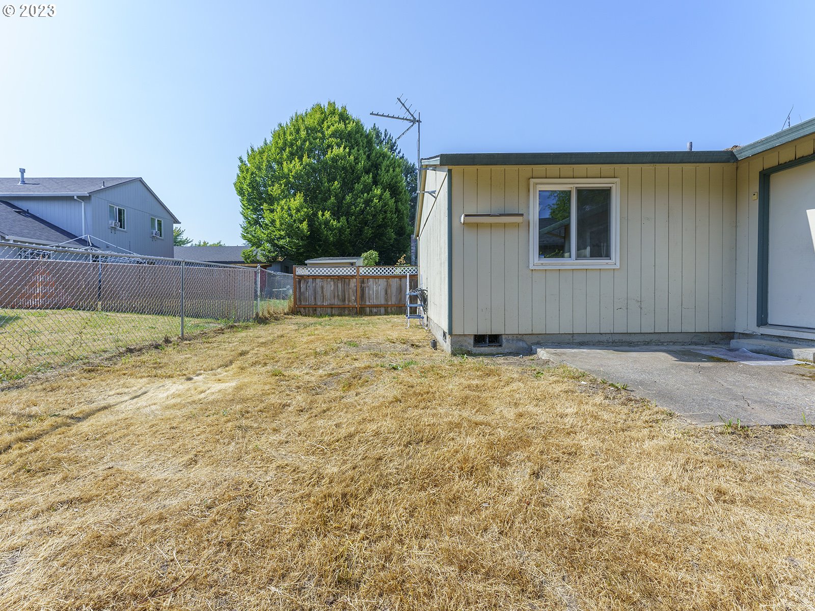 964 Southwest 179th Avenue Beaverton, OR 97003 - Photo 24 of 27 a house view with a backyard space