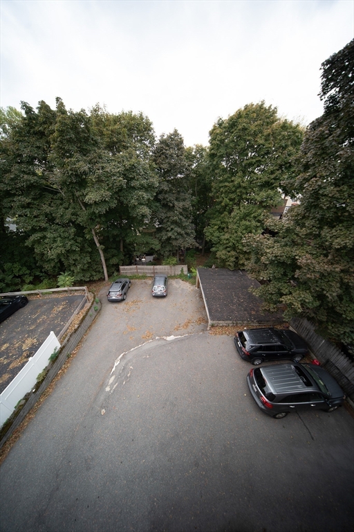 208 Rawson Road, Unit 3 Brookline, MA 02445 - Photo 27 of 33 a view of a street with a slide
