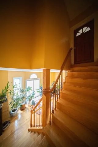 a view of a balcony with seating space