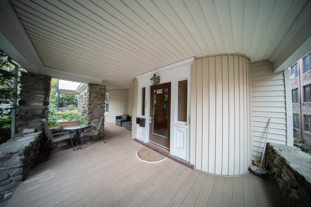 208 Rawson Road, Unit 2 Brookline, MA 02445 - Photo 30 of 33 a lobby with furniture and large window
