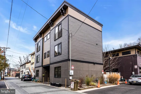 a view of a street with cars