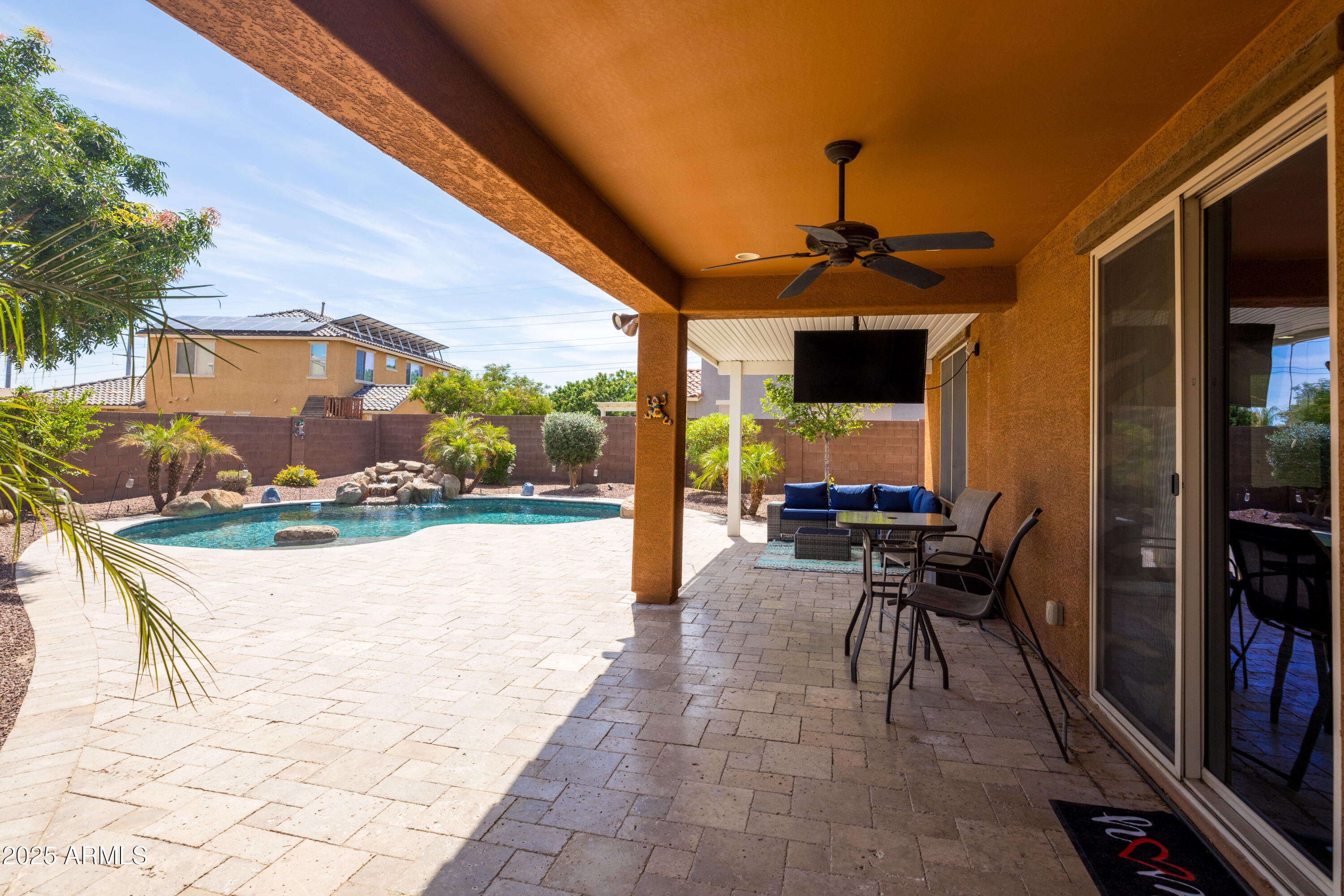 18649 West Williams Street Goodyear, AZ 85338 - Photo 27 of 42 a view of a porch with furniture and yard