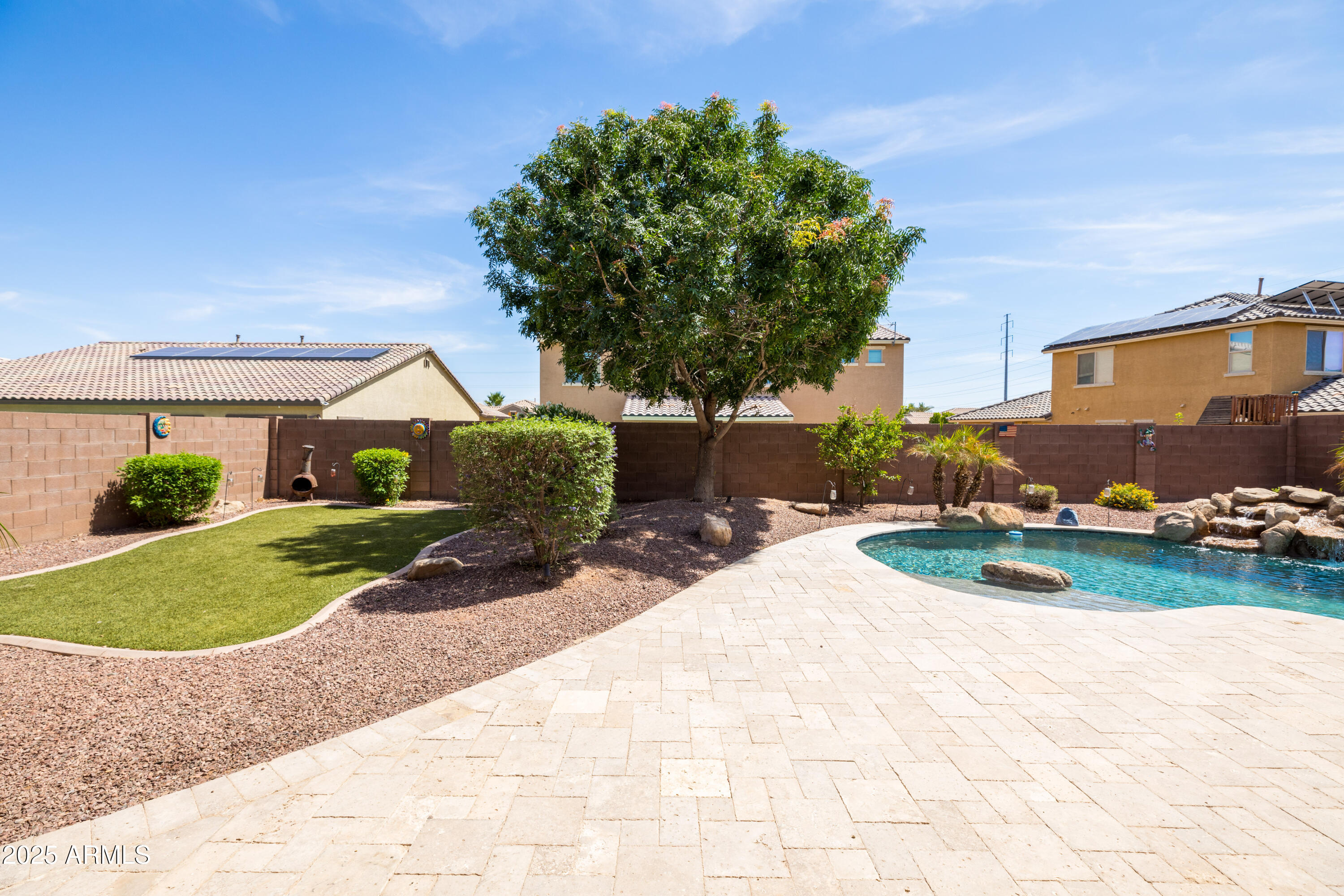 18649 West Williams Street Goodyear, AZ 85338 - Photo 29 of 42 a front view of a house with garden
