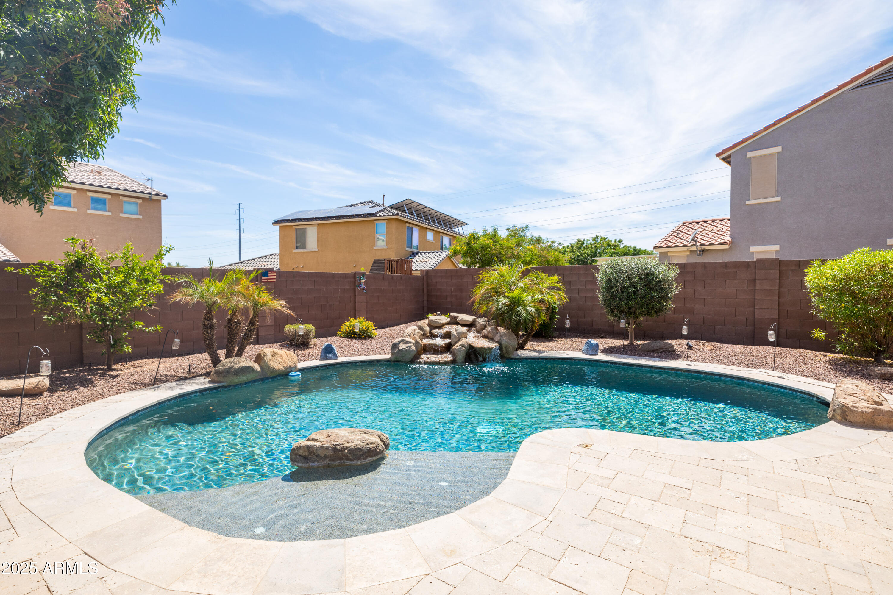 18649 West Williams Street Goodyear, AZ 85338 - Photo 32 of 42 a view of a backyard with swimming pool