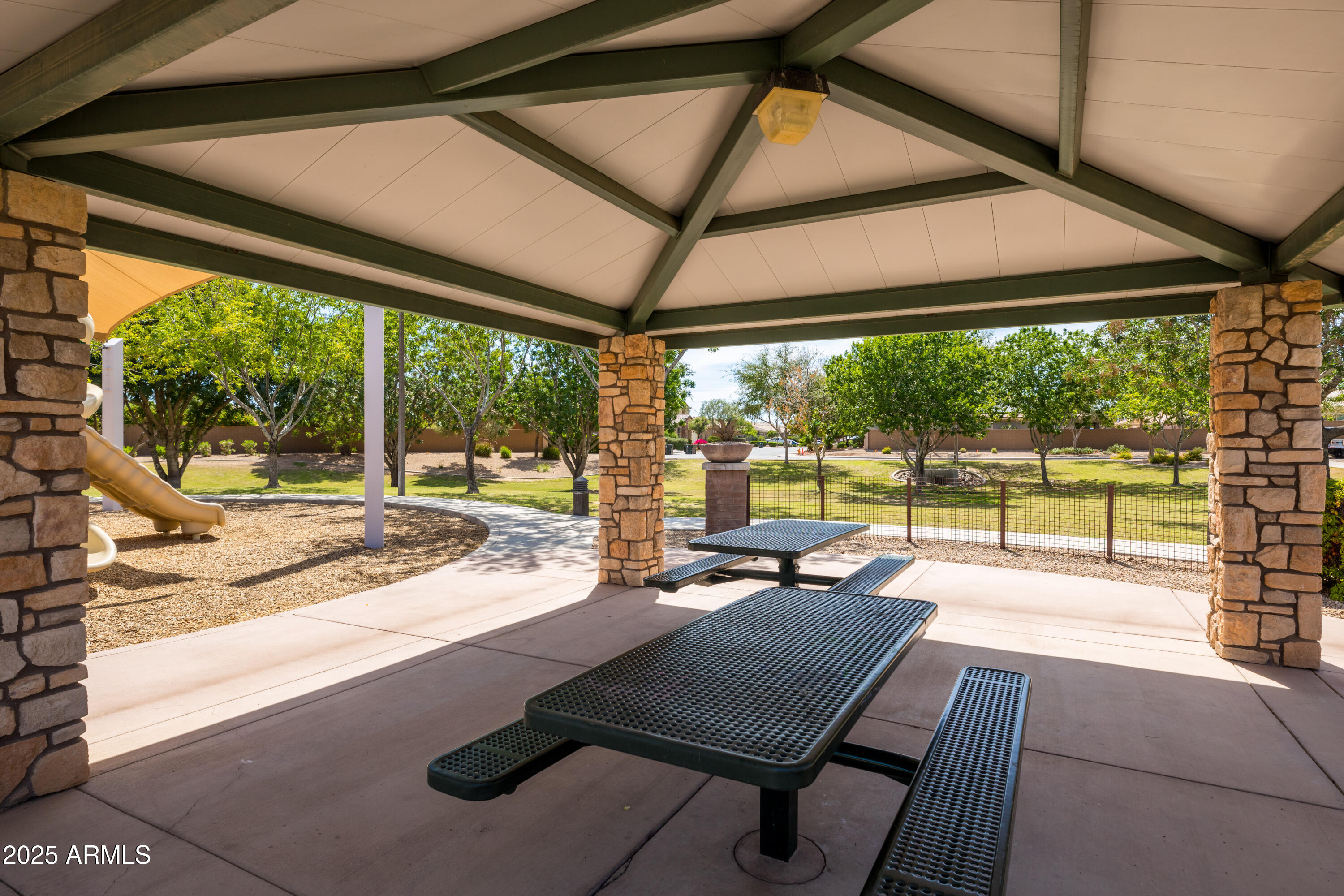 18649 West Williams Street Goodyear, AZ 85338 - Photo 42 of 42 a view of a porch with furniture and wooden floor