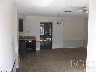 18320 Useppa Road Fort Myers, FL 33967 - Photo 4 of 10 a view of a kitchen with a sink and a window