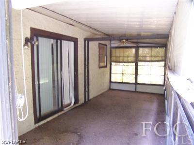 18320 Useppa Road Fort Myers, FL 33967 - Photo 8 of 10 an empty room with windows
