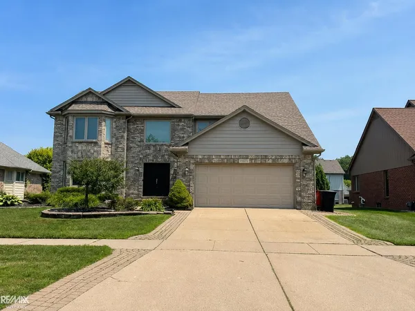 $470,000 | 46654 West Ridge Drive, Macomb, MI 48044