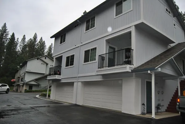 a house with trees in front of it