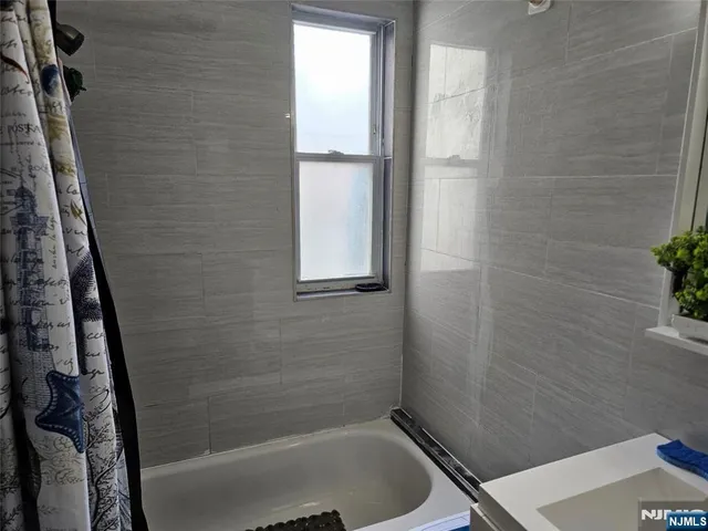 a bathroom with a bathtub