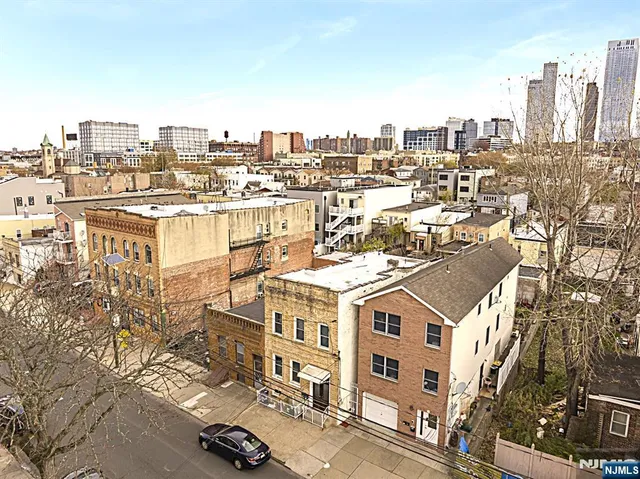 a view of a city that has tall buildings