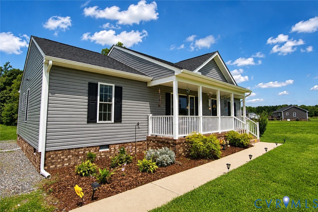 2255 Mahixon Road Manquin, VA 23106 - Photo 2 of 11 Charming farmhouse-style residence featuring a wel