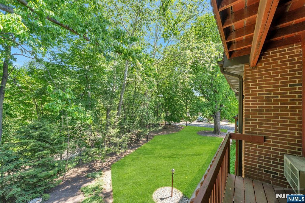 666 Mill Street, Unit C6 Belleville, NJ 07109 - Photo 22 of 25 a view of a backyard with a garden