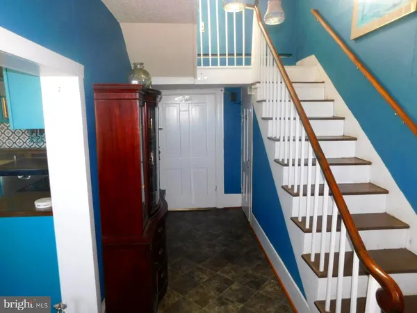 a view of an entryway with staircase