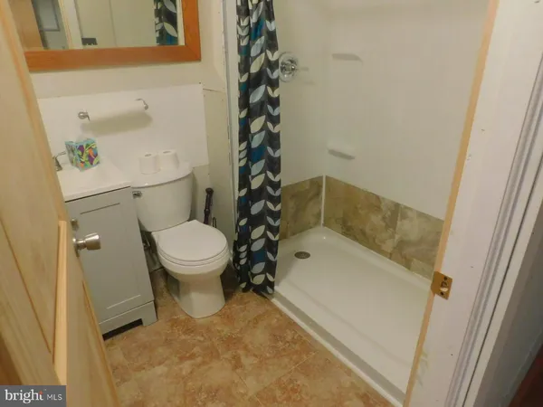 a view of a living room and utility room