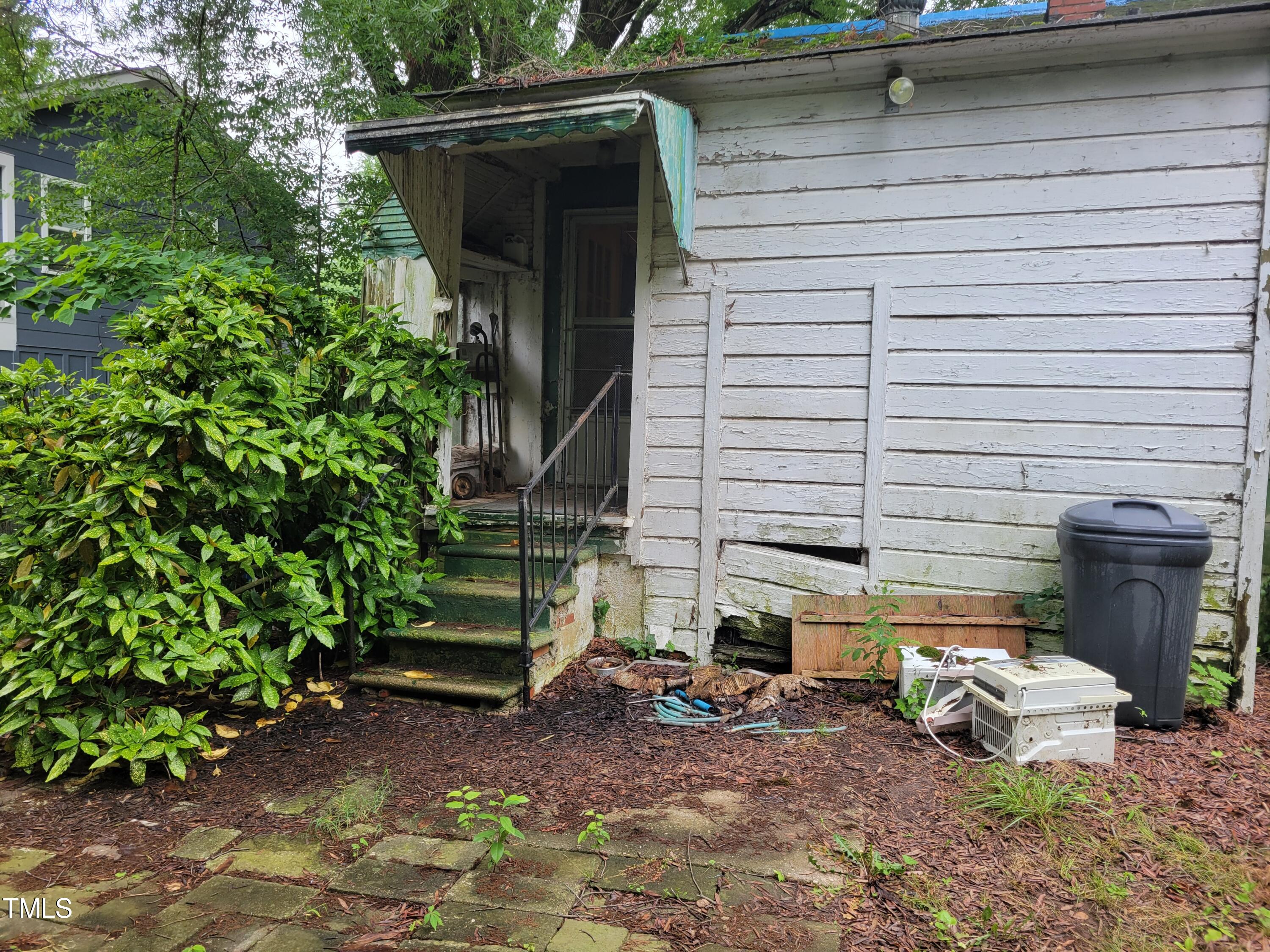 2521 Newbold Street Raleigh, NC 27603 - Photo 11 of 13 a front view of a house with garden
