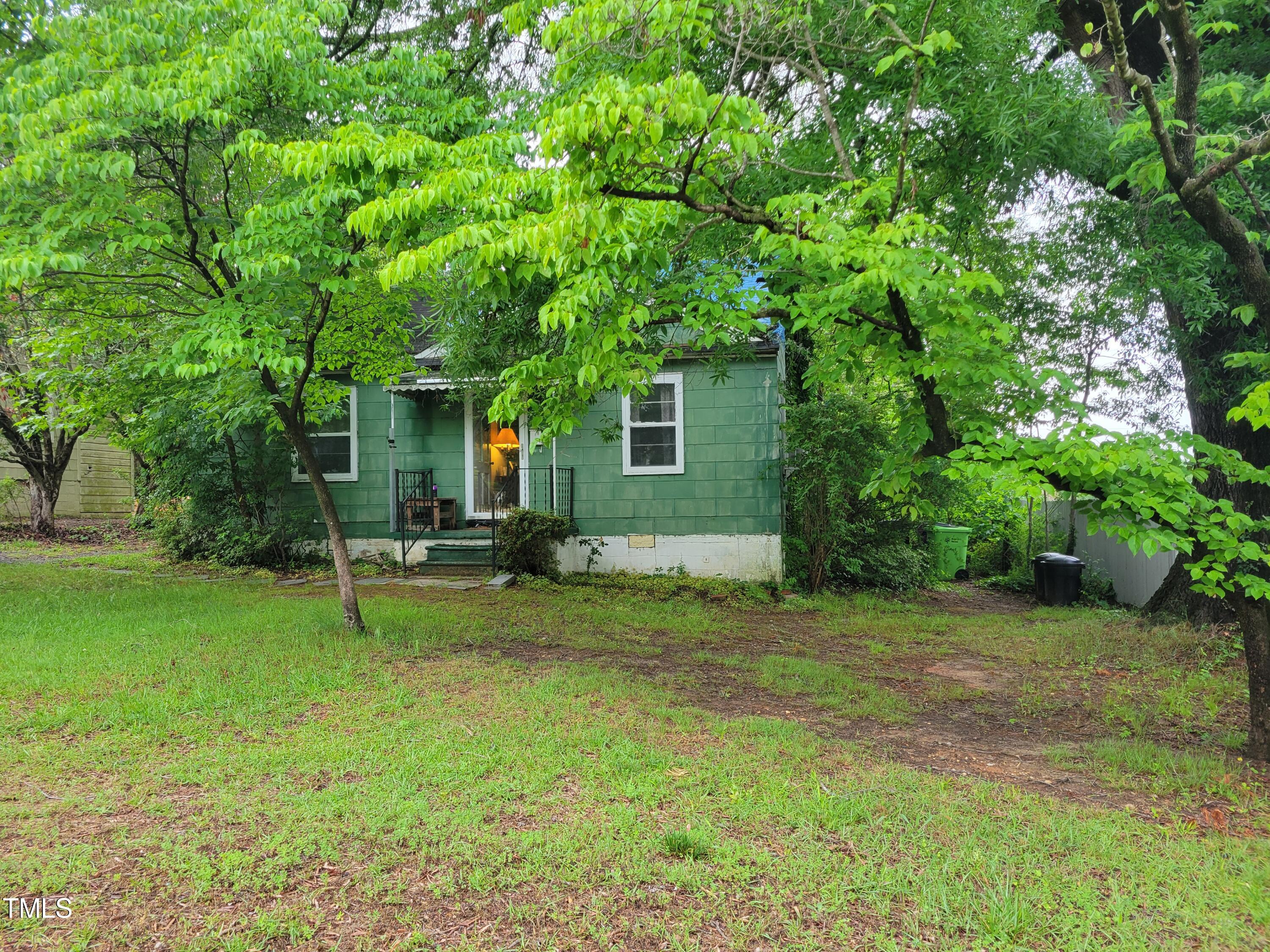 2521 Newbold Street Raleigh, NC 27603 - Photo 2 of 13 a view of a house with backyard and sitting area