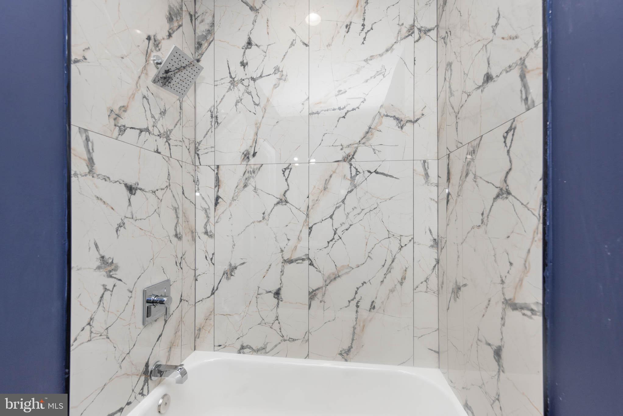 1713 North Bond Street Baltimore, MD 21213 - Photo 12 of 33 a bathroom with a bathtub