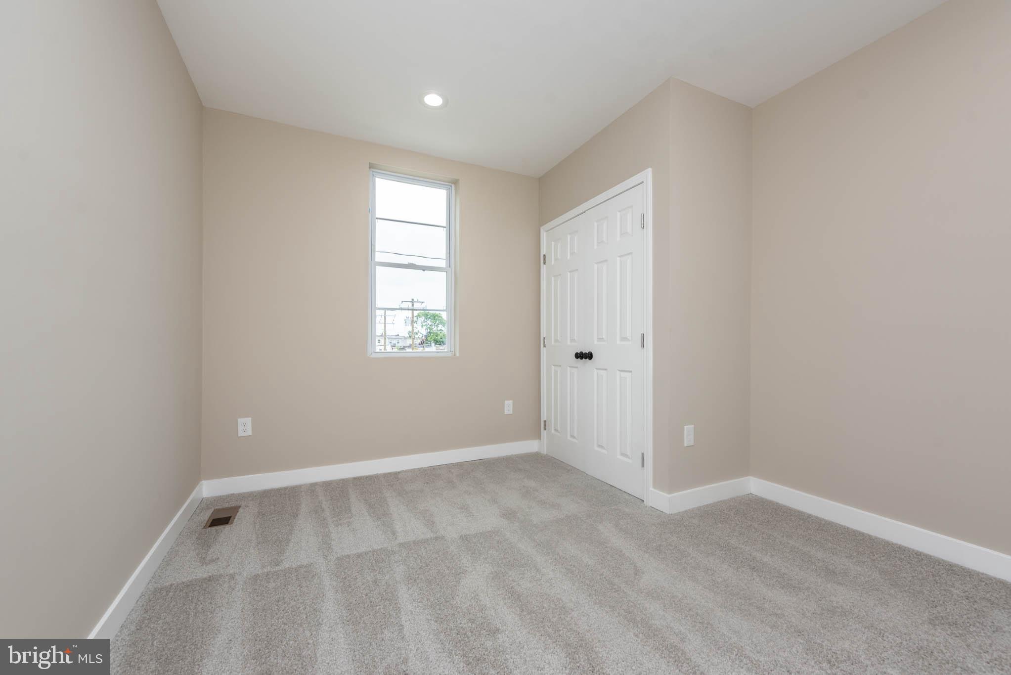 1713 North Bond Street Baltimore, MD 21213 - Photo 17 of 33 a view of an empty room with a window
