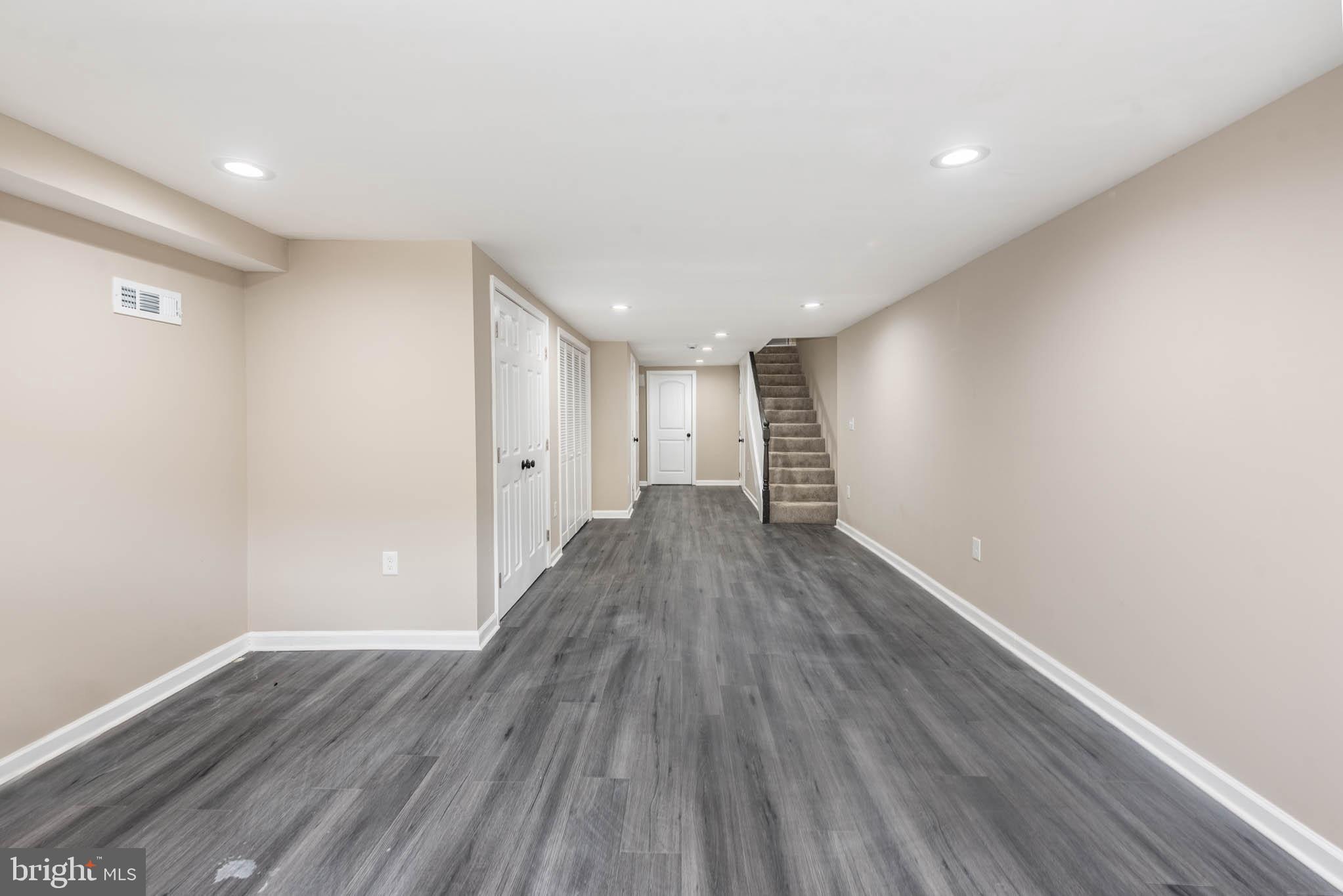 1713 North Bond Street Baltimore, MD 21213 - Photo 20 of 33 a view of empty room with wooden floor