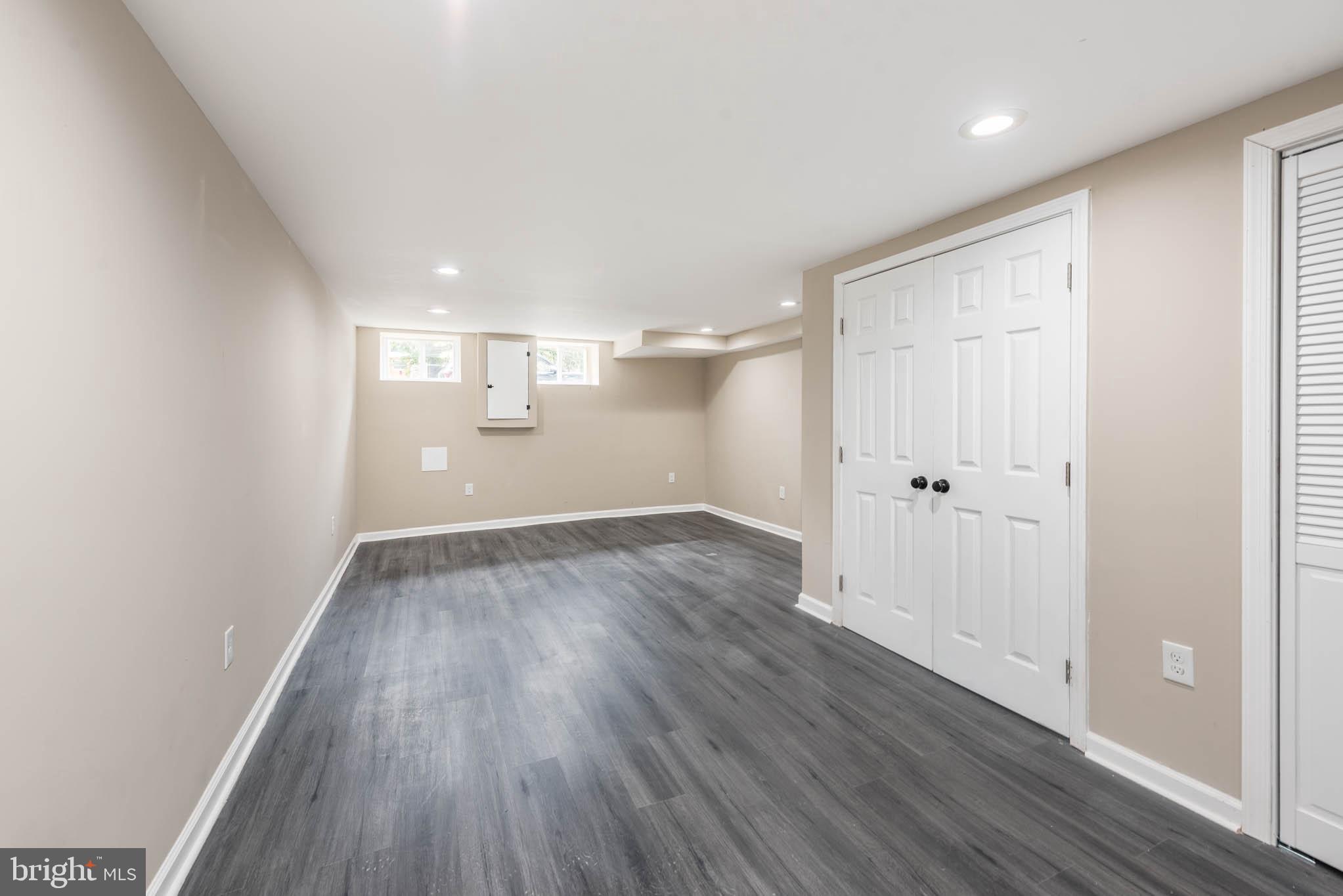 1713 North Bond Street Baltimore, MD 21213 - Photo 23 of 33 a view of empty room with wooden floor