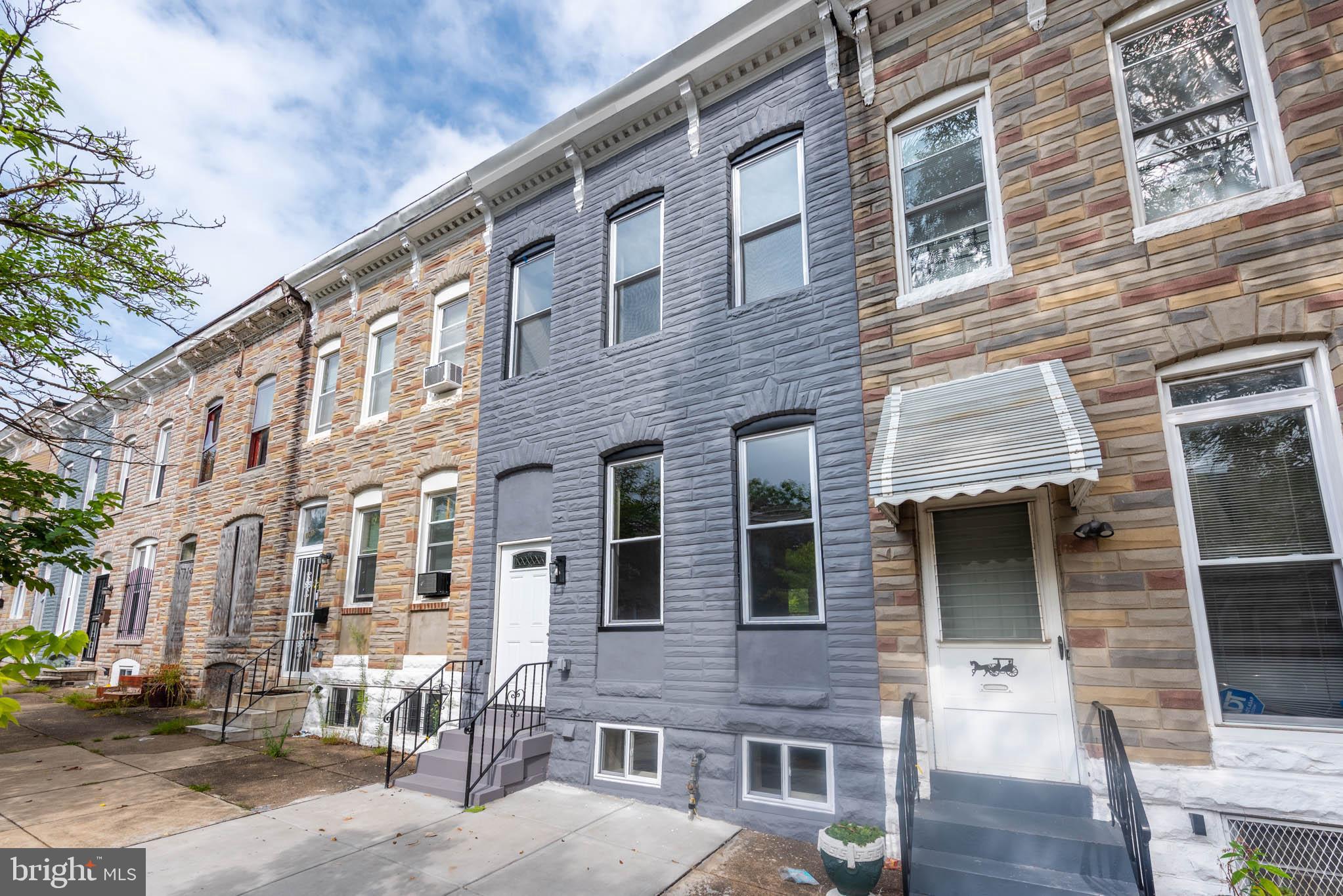 1713 North Bond Street Baltimore, MD 21213 - Photo 33 of 33 a front view of a building with a street