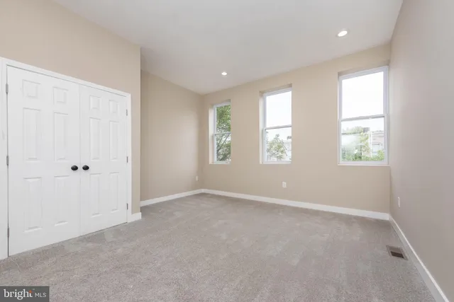 an empty room with windows