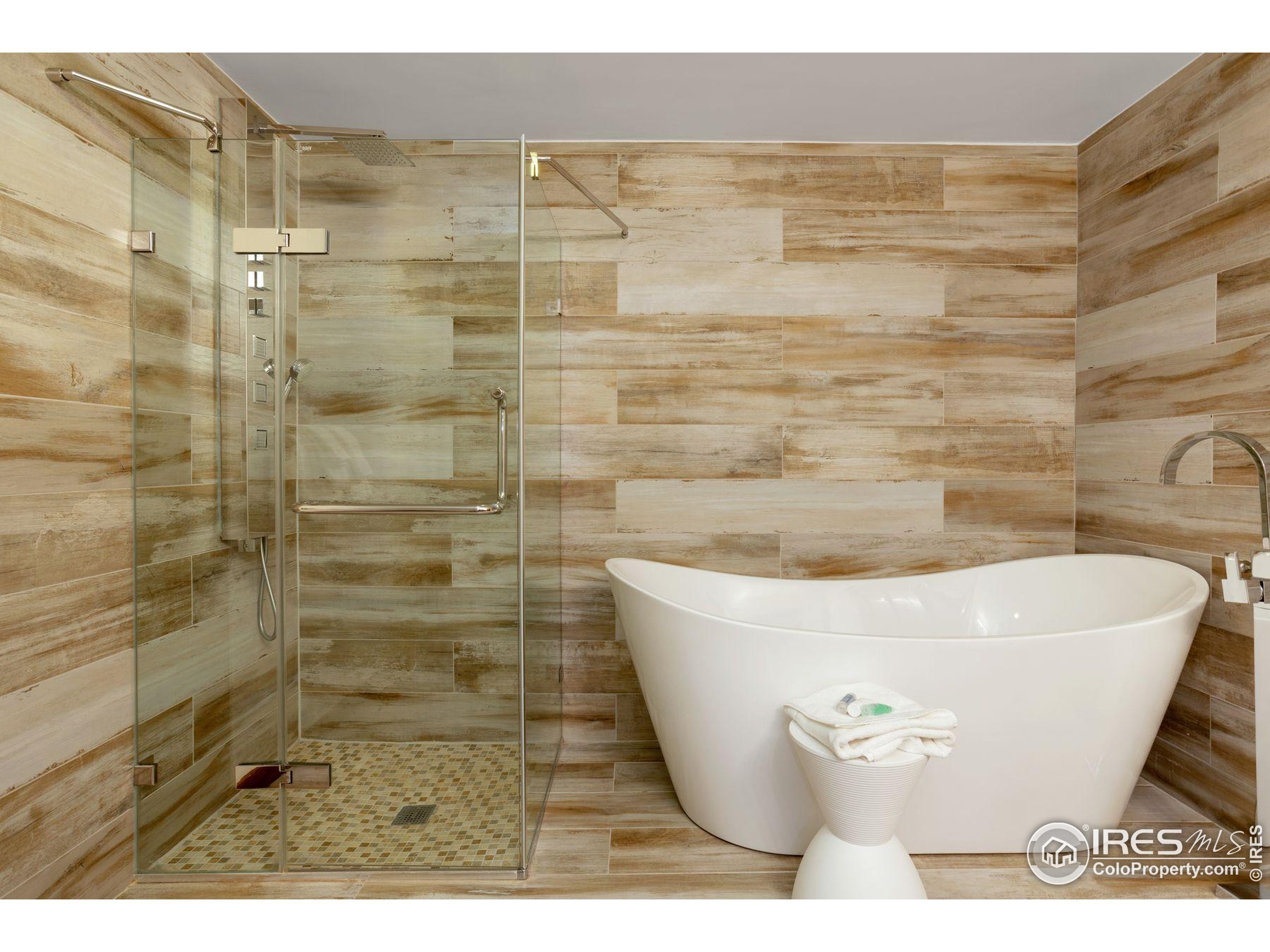 23110 Highway 6, Unit 5074 Dillon, CO 80435 - Photo 17 of 25 a white tub sitting in a bathroom