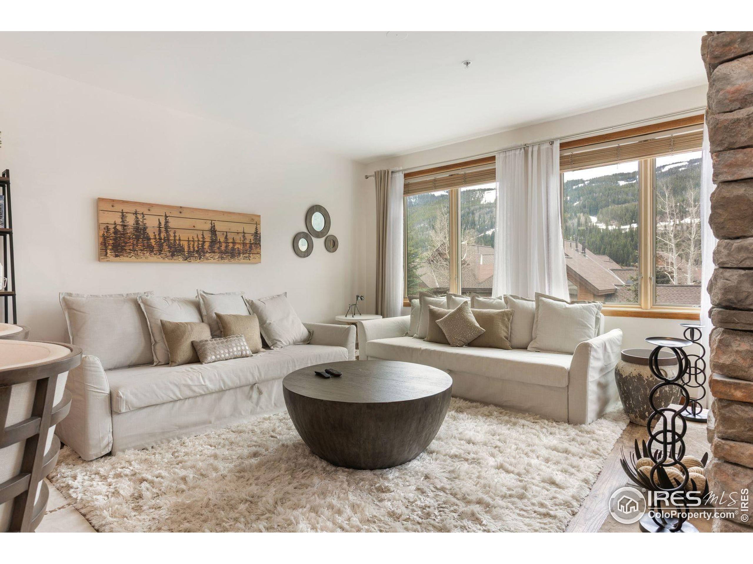 23110 Highway 6, Unit 5074 Dillon, CO 80435 - Photo 7 of 25 a living room with furniture and a large window