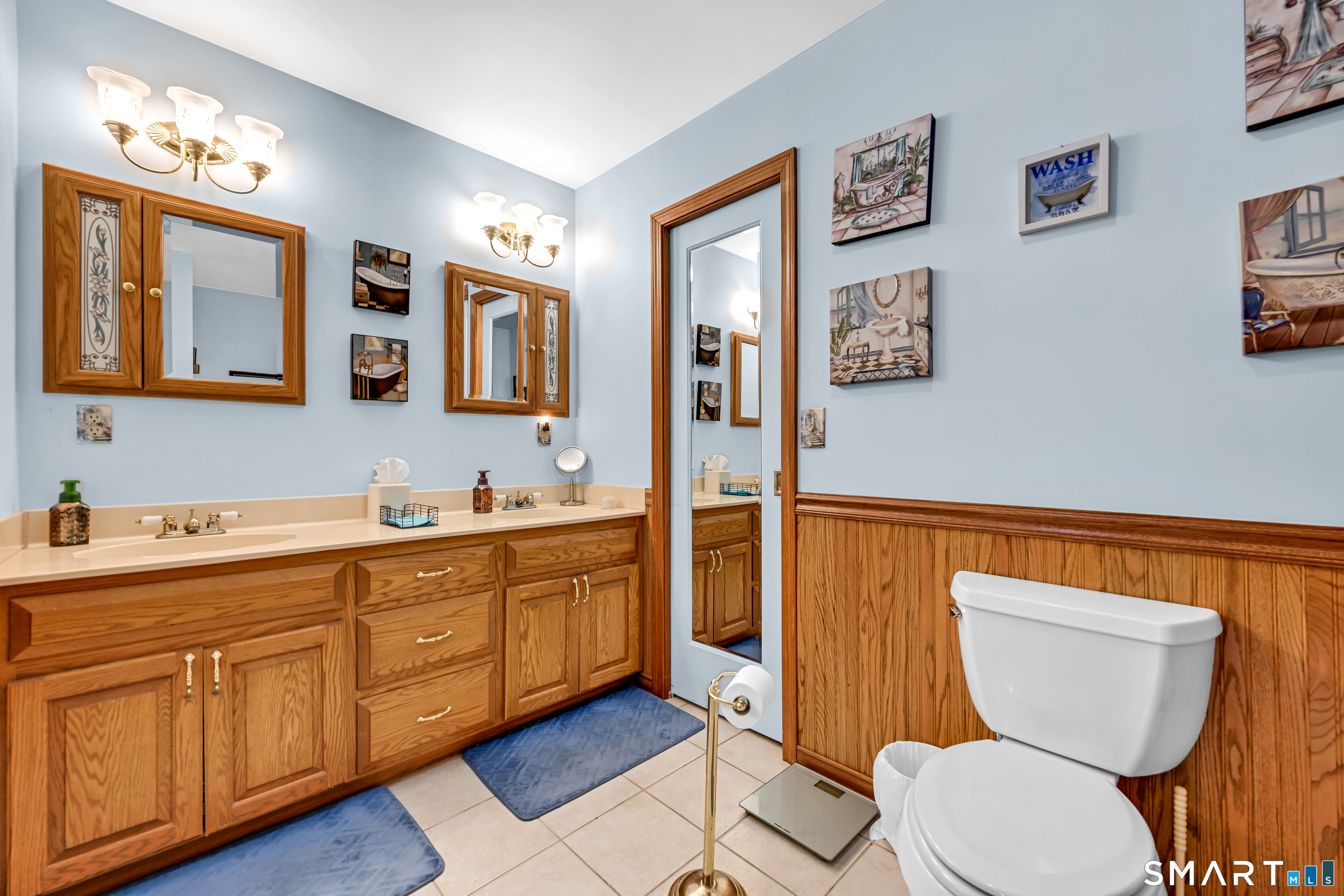155 Lake Harwinton Road Harwinton, CT 06791 - Photo 24 of 39 a bathroom with a toilet sink and mirror