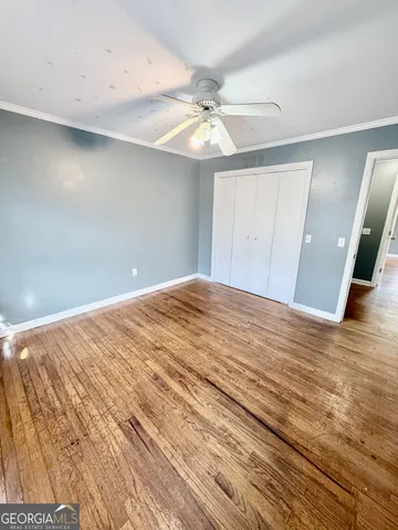 a bathroom with a sink toilet and mirror