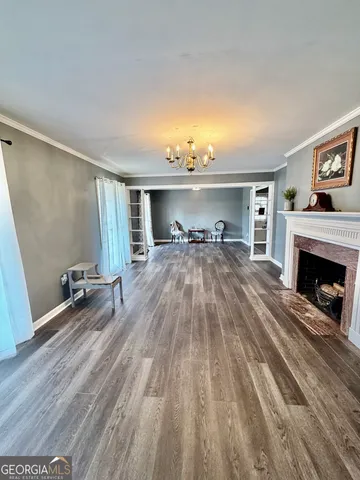 a view of livingroom with hardwood floor and a window