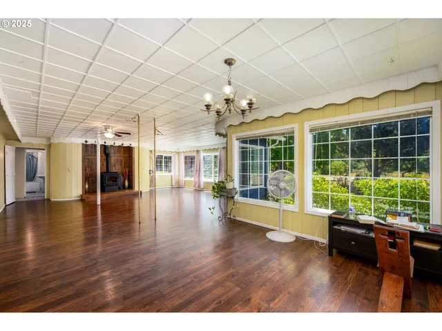 a view of a livingroom with wooden floor