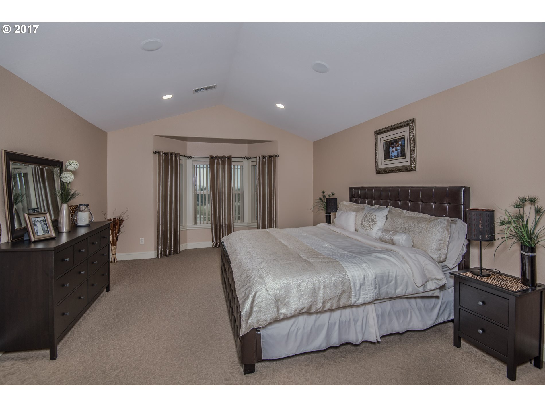 17980 Southeast Vogel Road Damascus, OR 97089 - Photo 17 of 32 a bedroom with a bed and a dresser