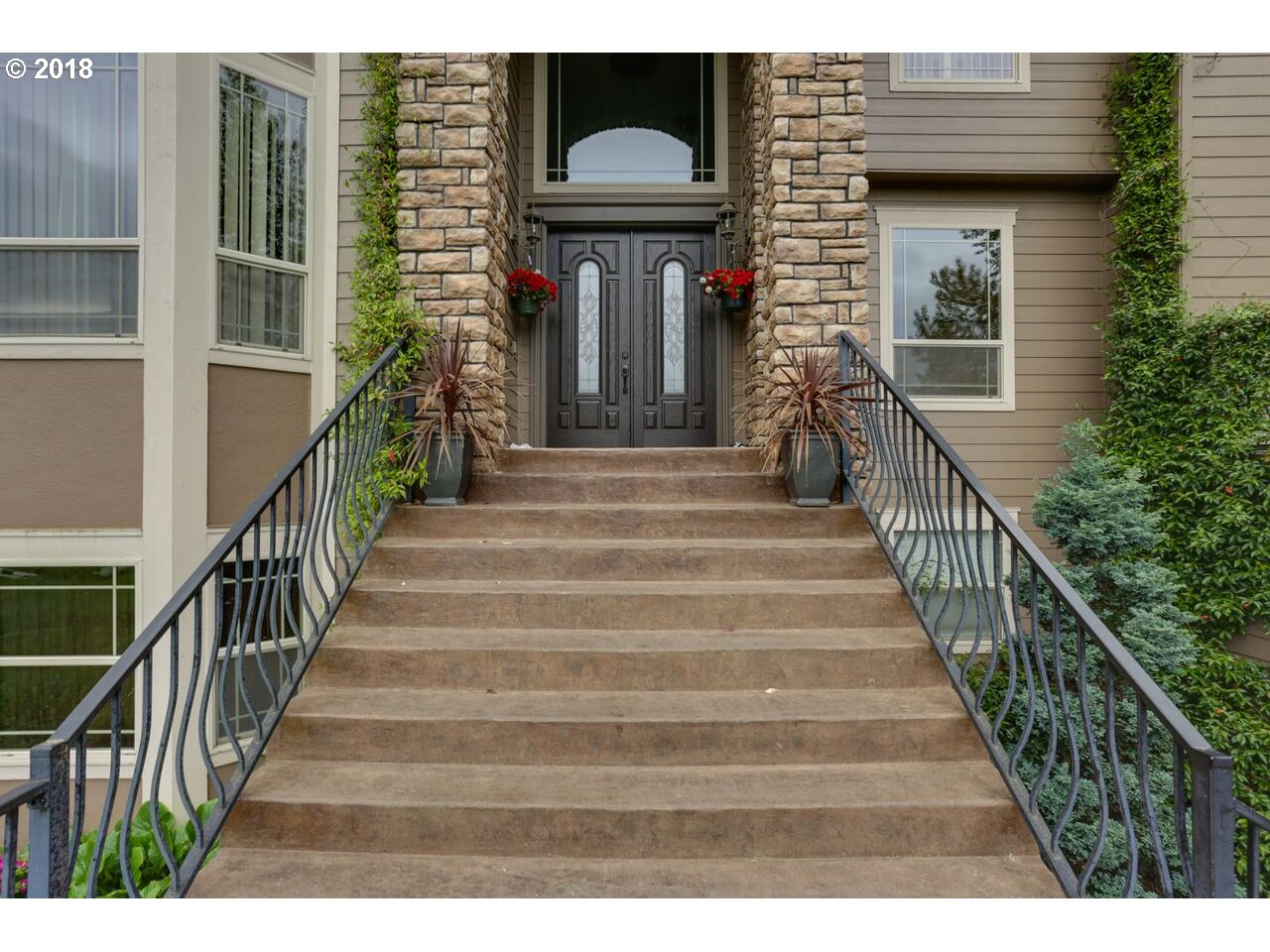 17980 Southeast Vogel Road Damascus, OR 97089 - Photo 2 of 32 a view of a entryway door of the house