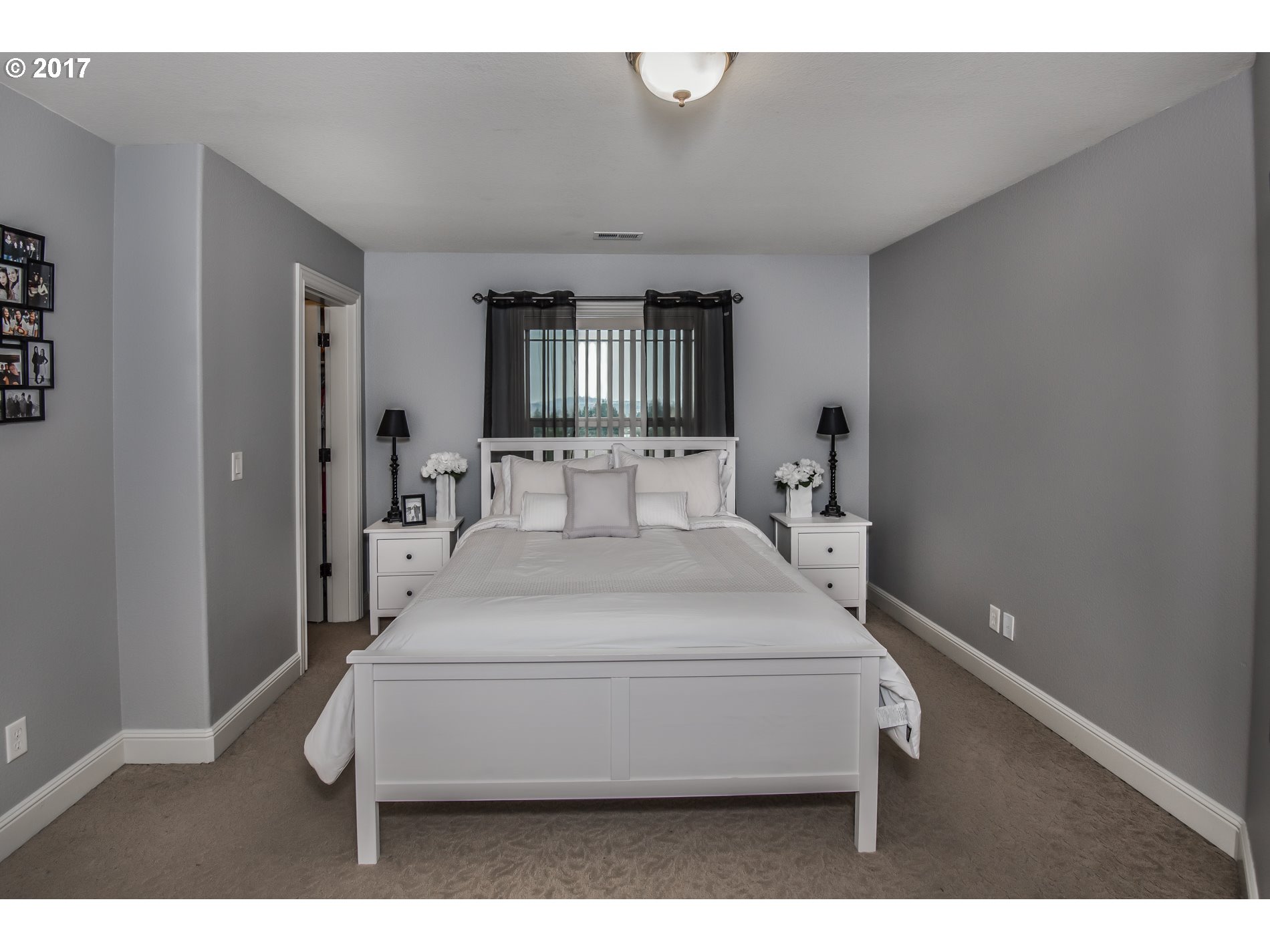 17980 Southeast Vogel Road Damascus, OR 97089 - Photo 25 of 32 a bedroom with a bed and window