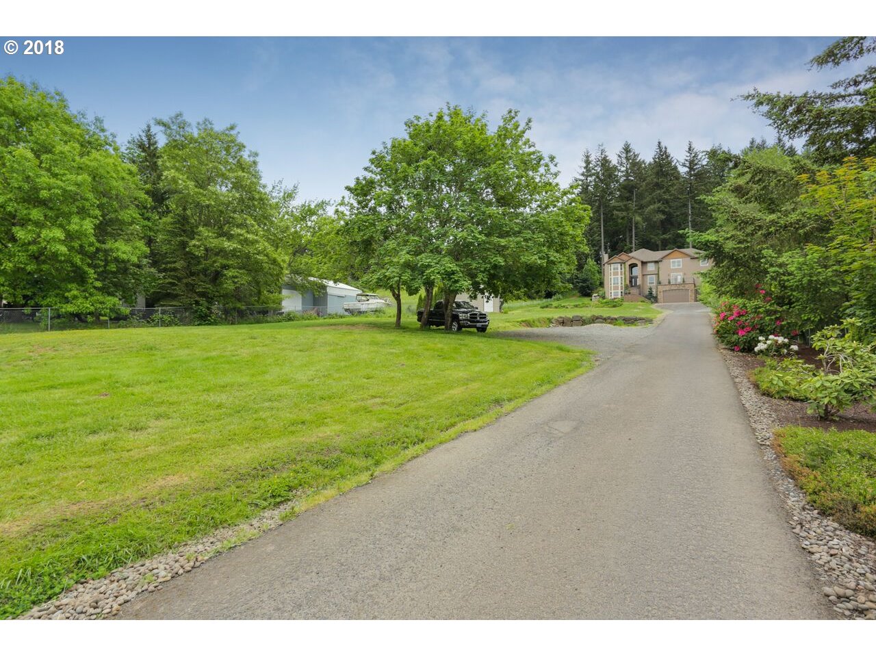 17980 Southeast Vogel Road Damascus, OR 97089 - Photo 32 of 32 a view of a yard with a house
