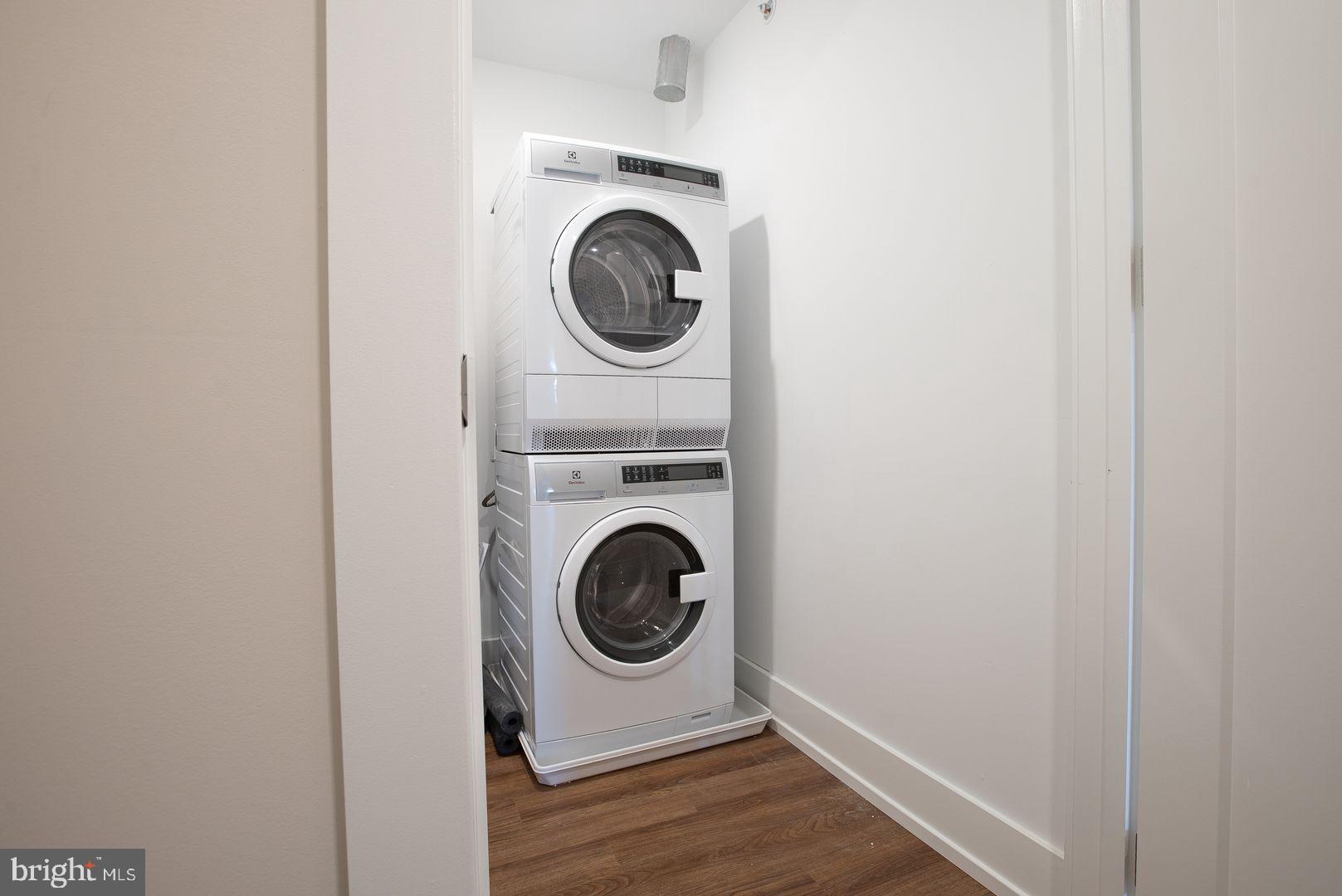 4534 Spruce Street, Unit 1BD3 Philadelphia, PA 19139 - Photo 6 of 9 a utility room with dryer and washer