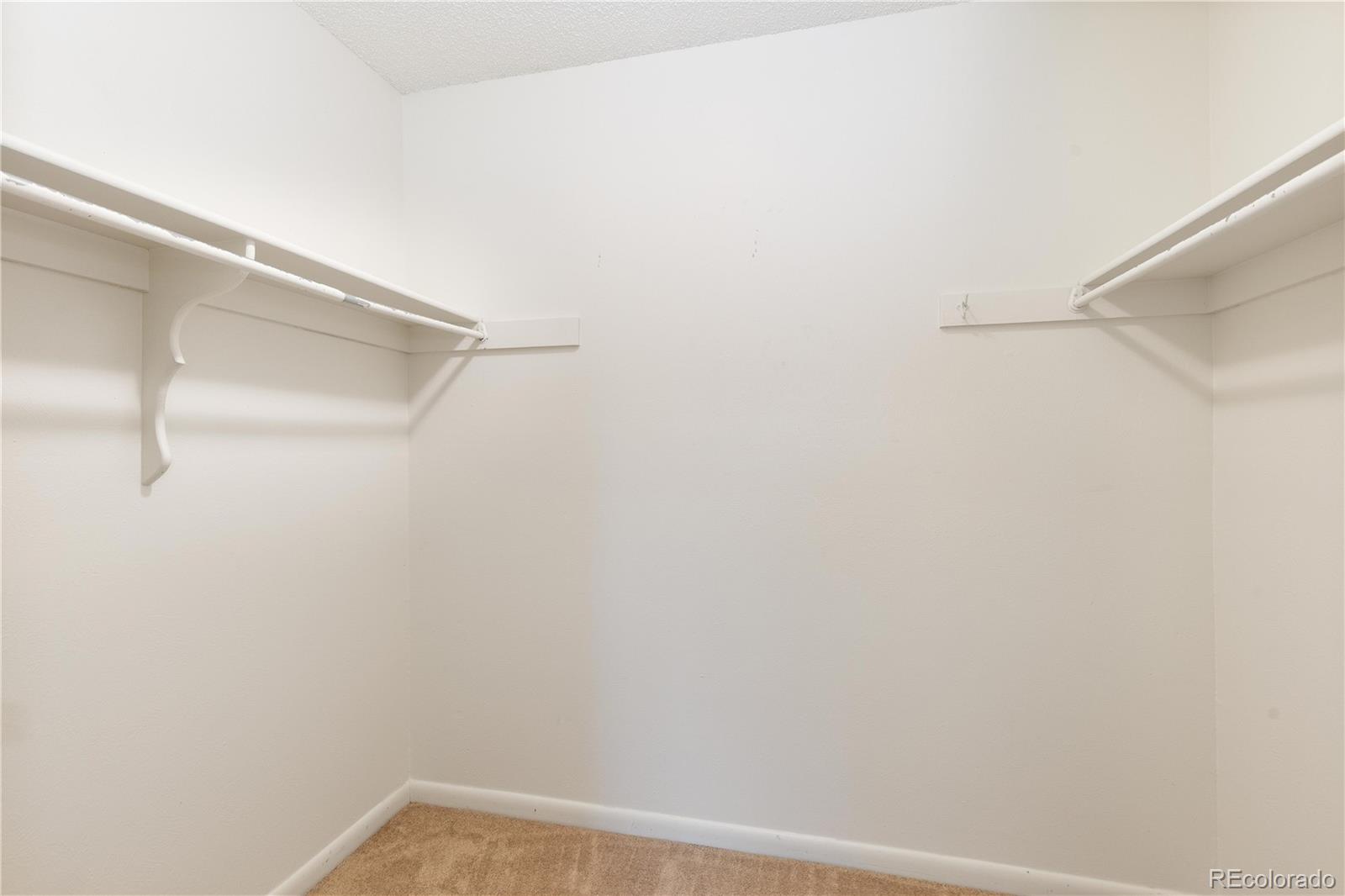 4068 South Atchison Way, Unit 202 Aurora, CO 80014 - Photo 19 of 33 a view of small space with racks on the wall