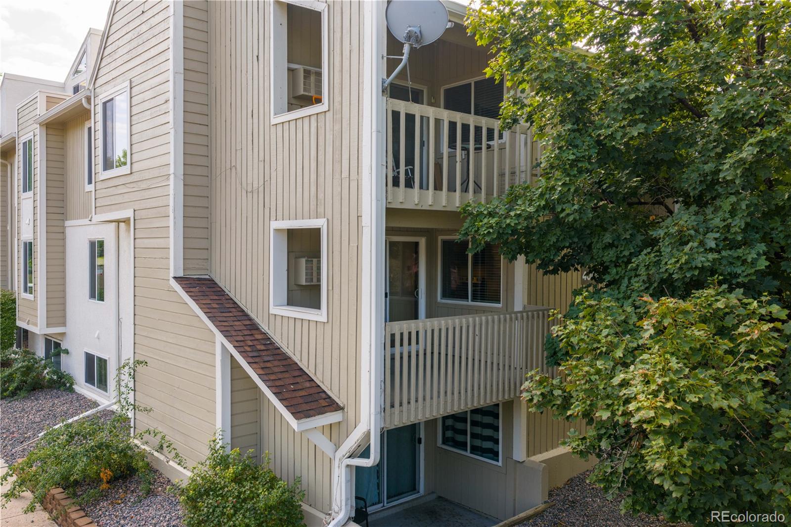 4068 South Atchison Way, Unit 202 Aurora, CO 80014 - Photo 26 of 33 a view of a house with iron stairs