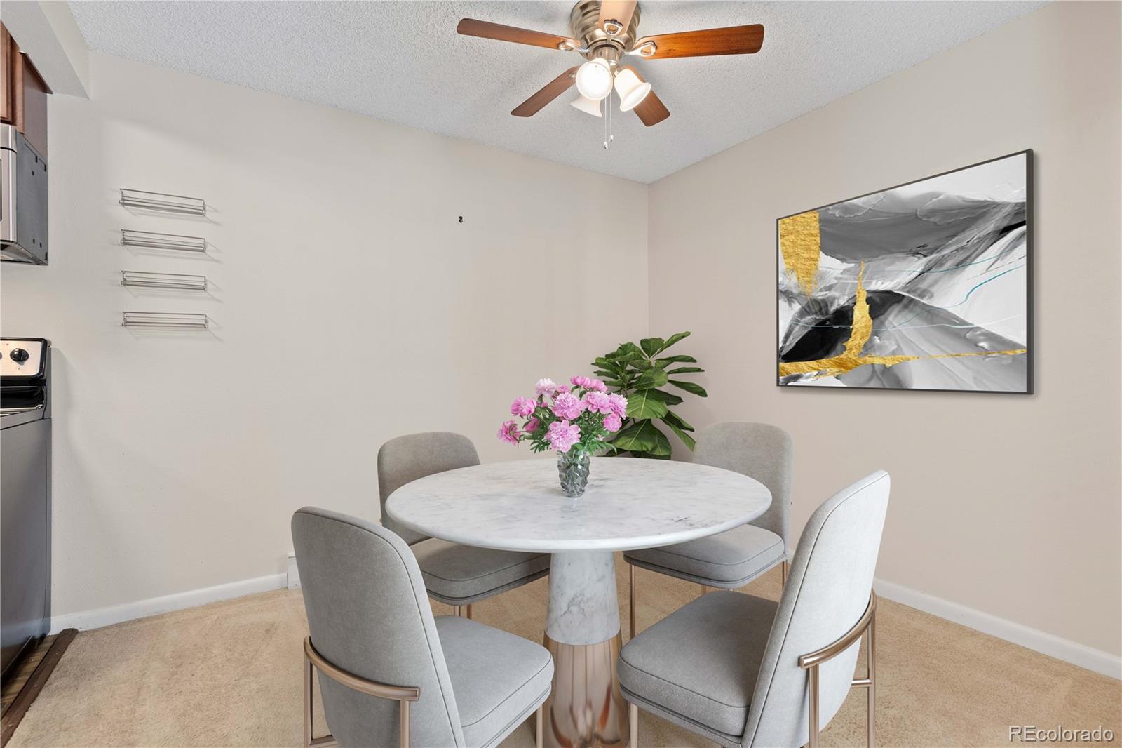 4068 South Atchison Way, Unit 202 Aurora, CO 80014 - Photo 3 of 33 a dining room with furniture and window