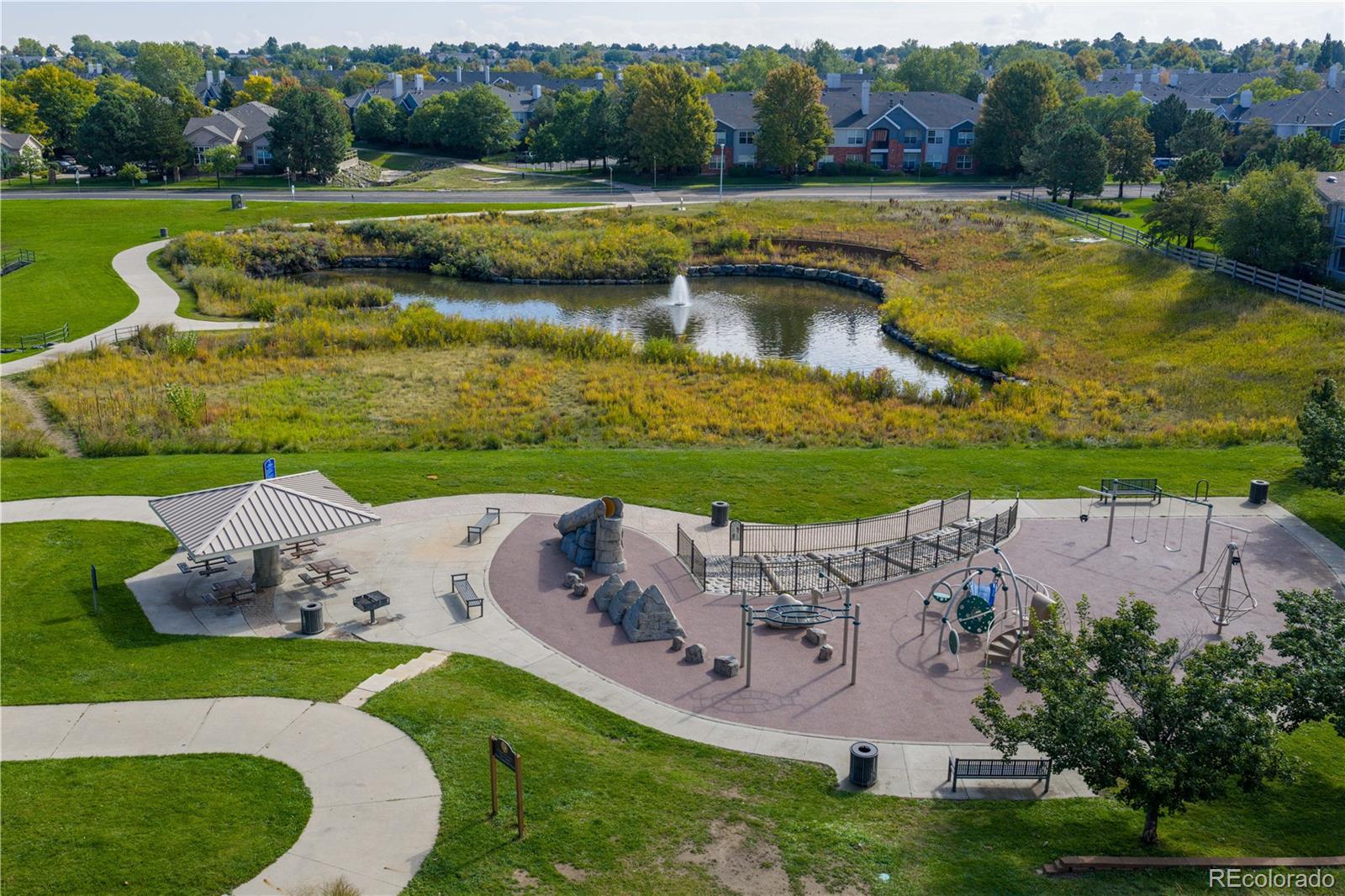 4068 South Atchison Way, Unit 202 Aurora, CO 80014 - Photo 31 of 33 a view of a swimming pool with a yard