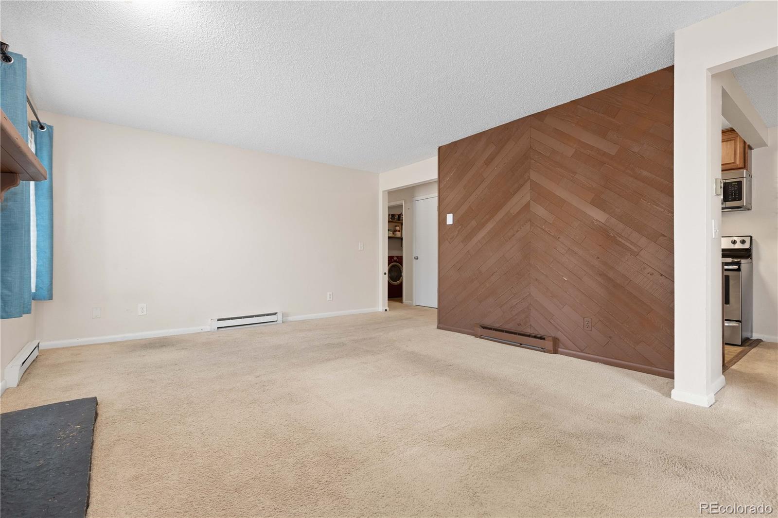 4068 South Atchison Way, Unit 202 Aurora, CO 80014 - Photo 7 of 33 a view of an empty room with a window