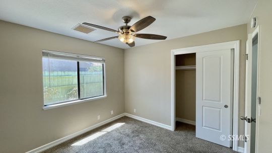 959 Jefferson Street Ridgecrest, CA 93555 - Photo 15 of 24 a view of an empty room with a window