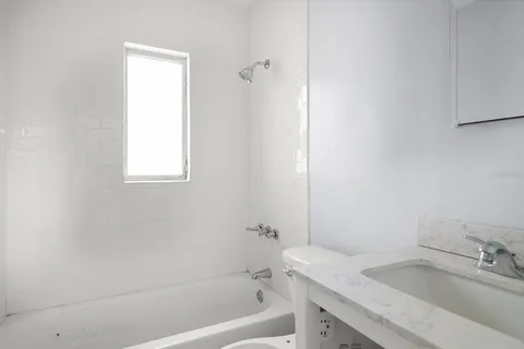 a view of a backyard with a lake view