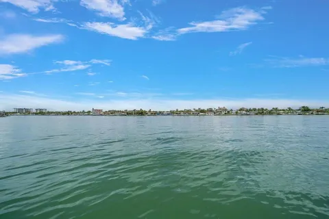 a view of a lake with a city
