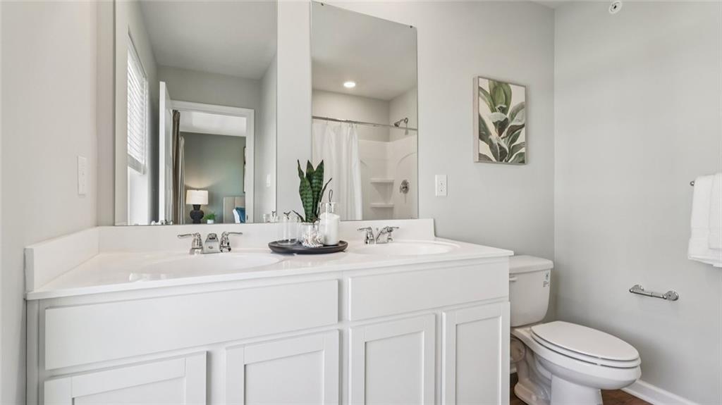 263 Truth Circle Harmony, PA 16037 - Photo 12 of 19 a bathroom with a sink and a toilet