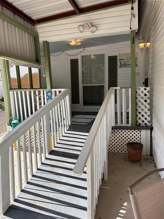 206 Holiday Rambler Drive Whitney, TX 76692 - Photo 1 of 28 Front porch entry has ramp for easy access and moving things in & out
